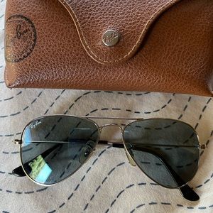 Ray-ban aviator sunglasses. Blue/grey lenses with silver frames.